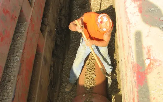 worker laying VCP