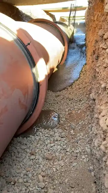CLSM placement and flow into pipe haunches